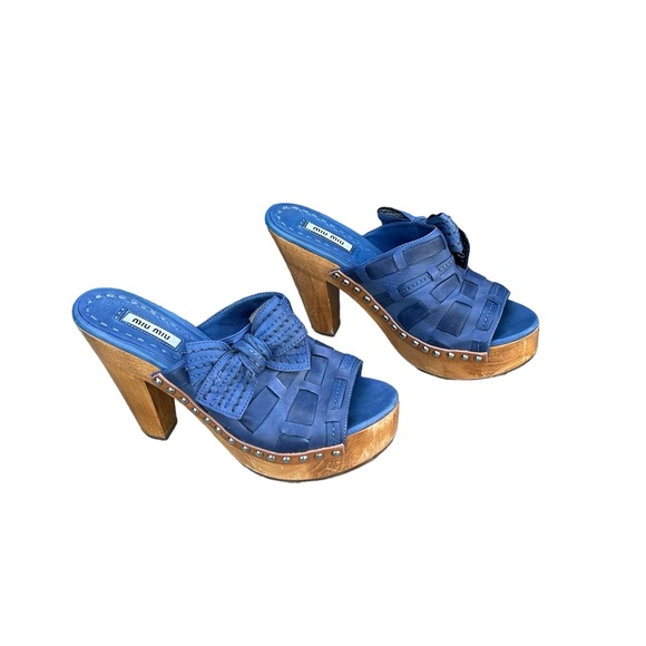 Miu Miu Shoes - Miu Miu Blue Leather Bow Studs Heeled
Platform‎ Clogs. Size 6